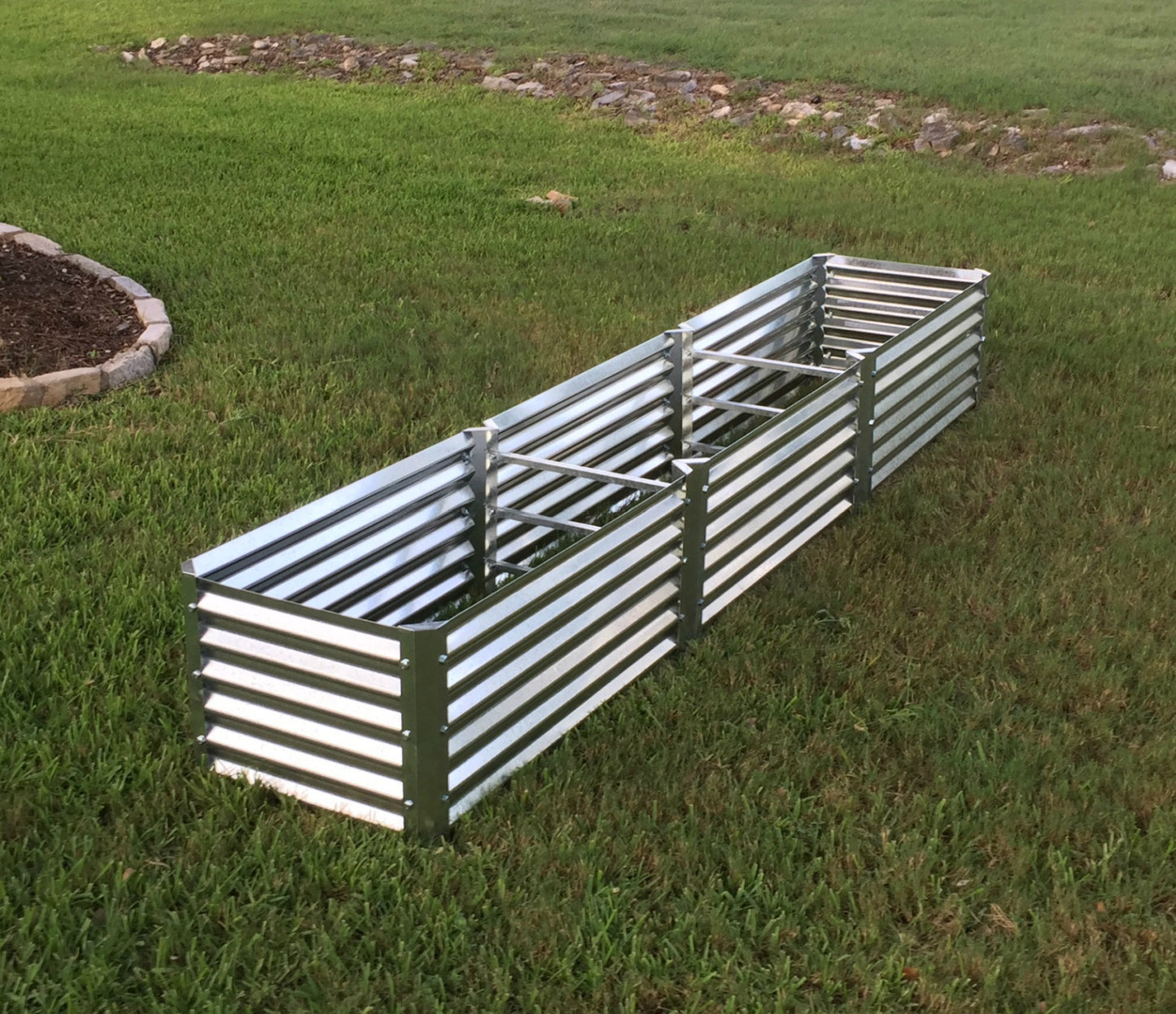 narrow largo garden bed installed