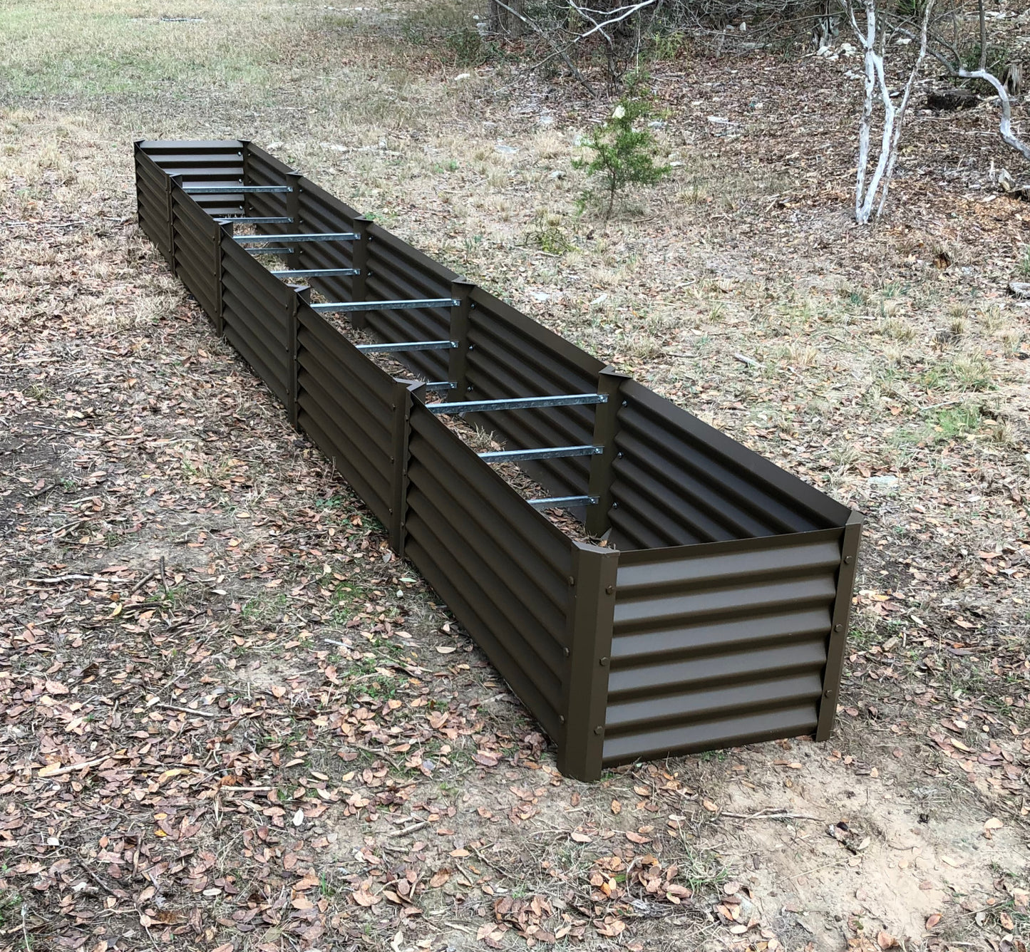 narrow rustic sandia raised garden installed